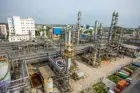 Industrial plant with processing towers and pipes