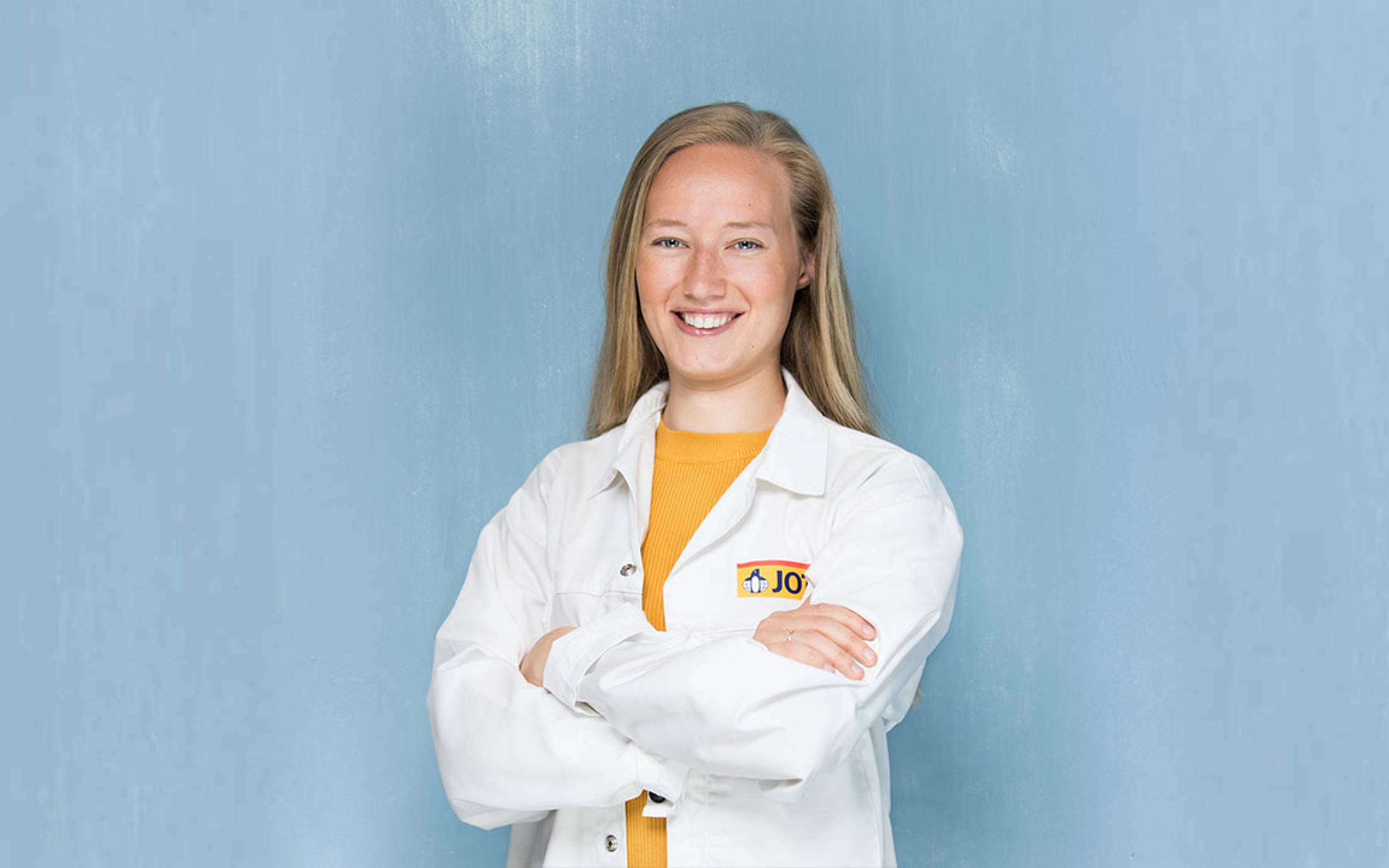 Female scientist in white uniform